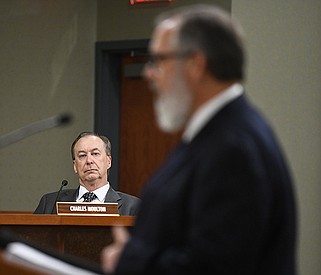 Charles Moulton, Administrative Law Judge for the Pollution Control and Ecology Commission, listens to discussion about an appeal of the DEQ's permit for proposed subdivision, Paradise Valley’s, waste water treatment plant during a Commission Meeting on Friday, April 26, 2024...(Arkansas Democrat-Gazette/Stephen Swofford)